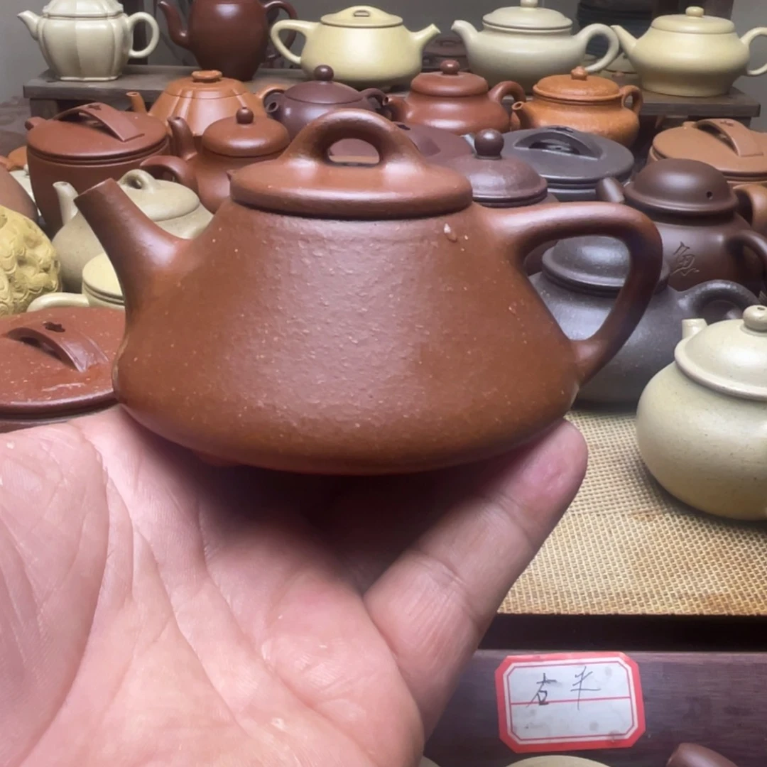 紫砂茶壶揭**人宜兴紫砂壶工艺品
