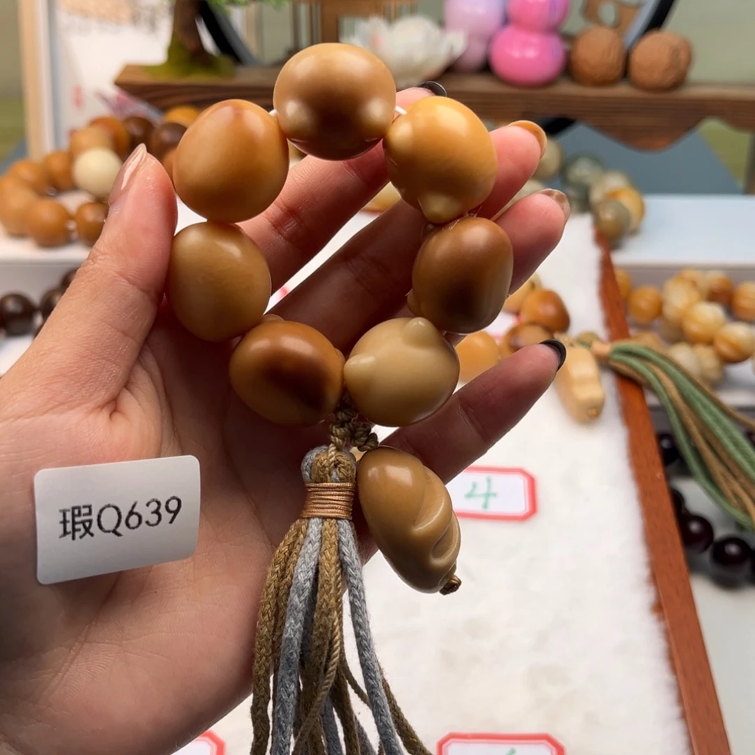 菩提根/象牙果手串公*糖20mm猫头手捻一串瑕Q639