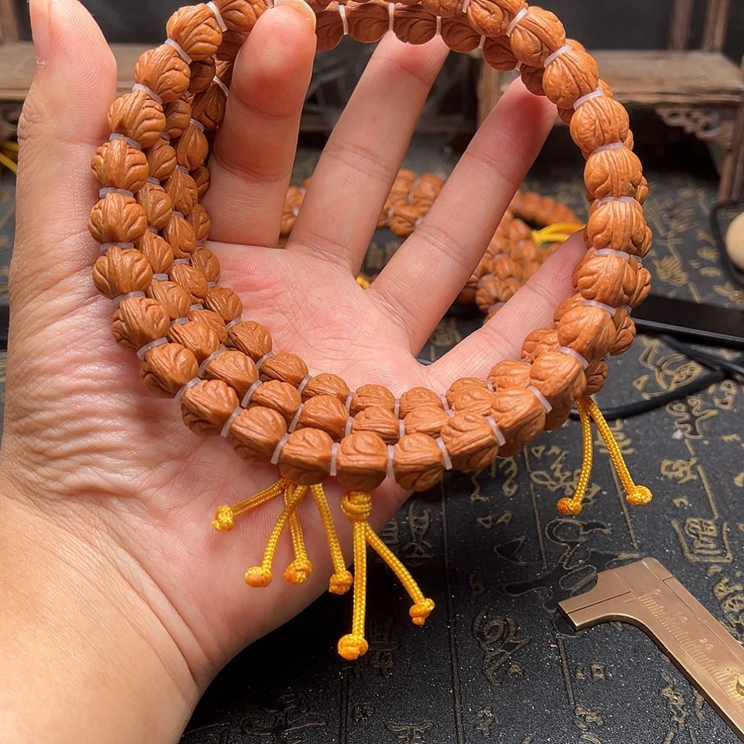 桃核吊坠玉龙手持