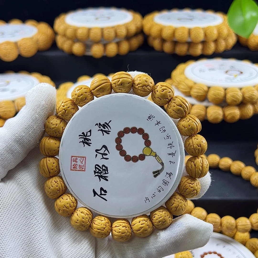 弟***拉桃核手串野生桃核手串