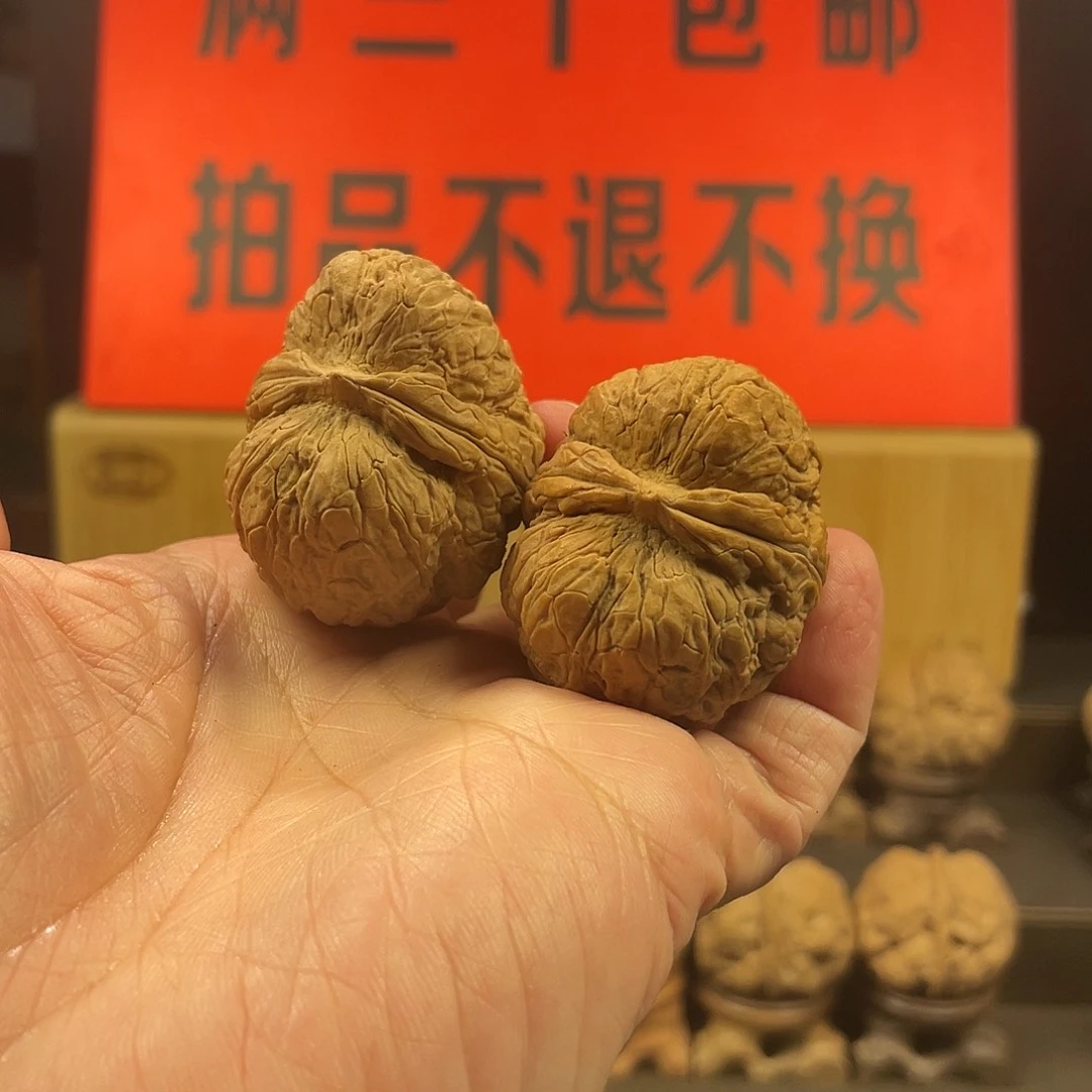 文玩核桃把件金锭子