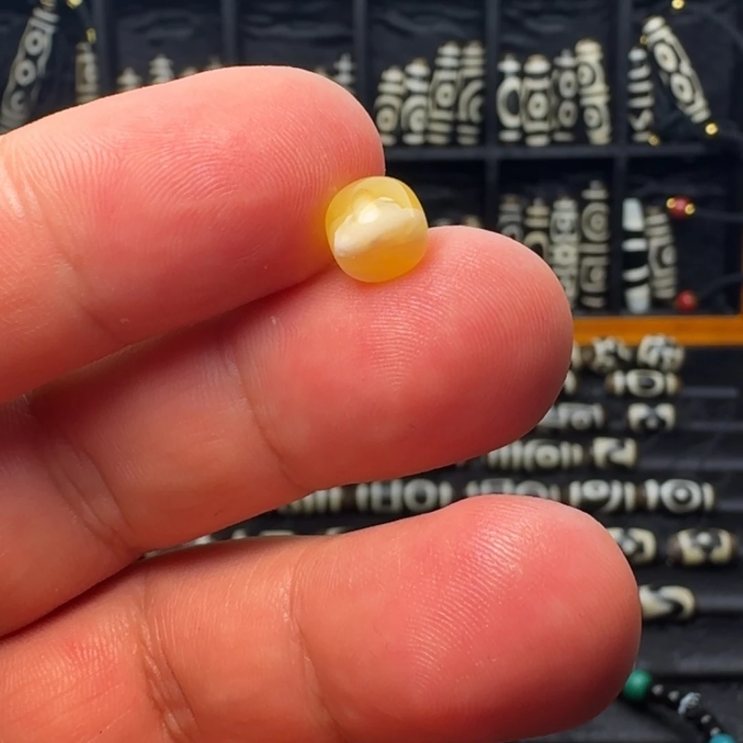 母***师未镶嵌琥珀戒指好