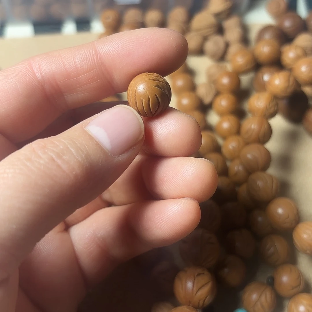 桃核吊坠$**。秦岭龙文光洙1.3尺20颗