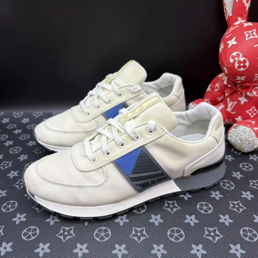 95新 Prada/普拉达 男士米白色布面运动鞋40欧码 ddm2707