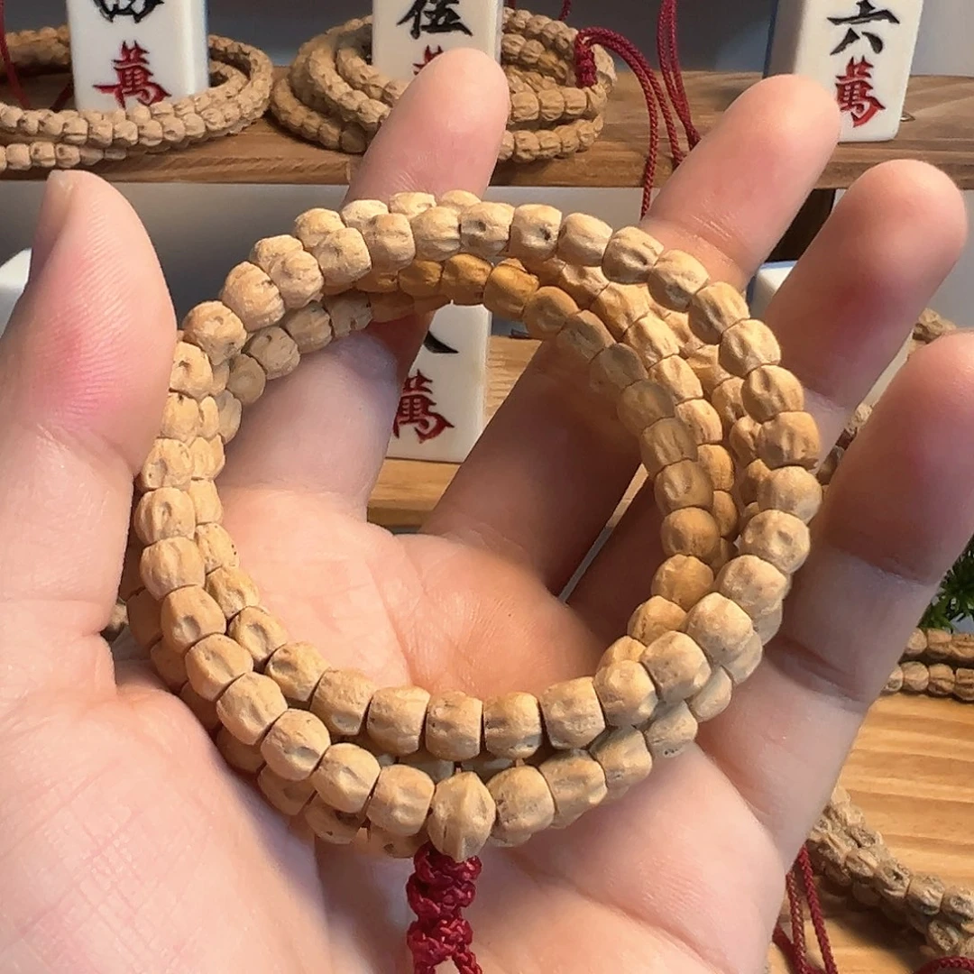 柏香籽/百香籽吊坠莲****店