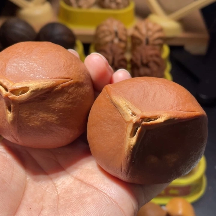 朰***蠃文玩核桃吊坠蟠桃橄榄核54尺