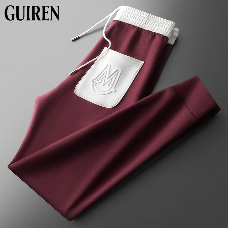 轻奢潮流冰丝高端休闲白色运动裤修身束脚夏季薄款透气男士卫裤