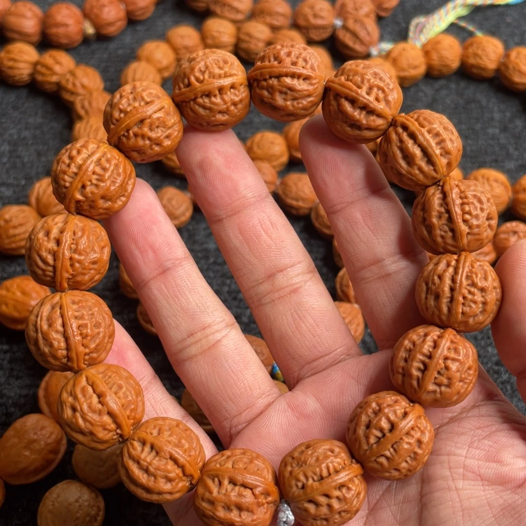 陈***驰文玩核桃手串一道筋元宝