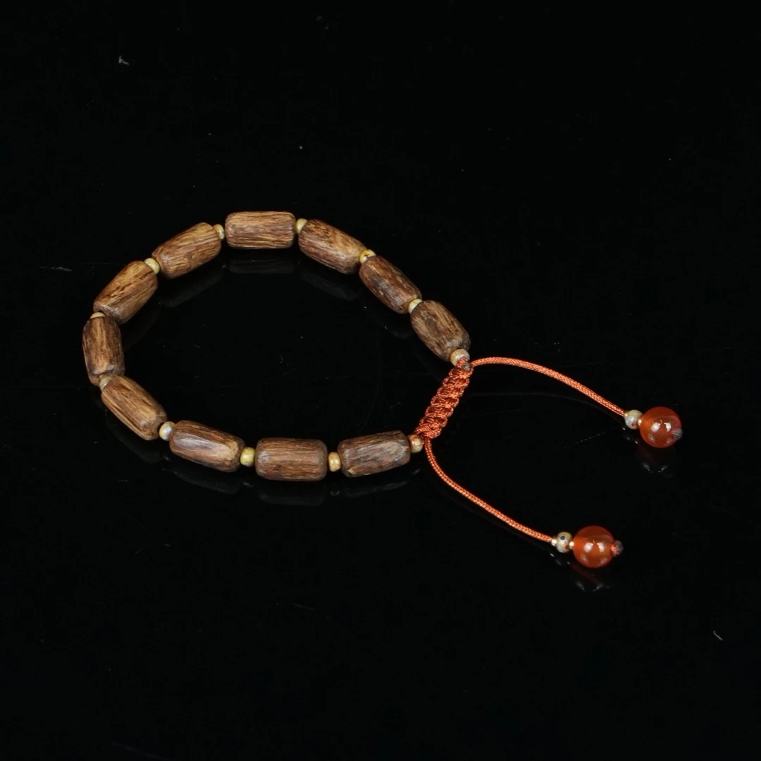 A4048巴布亚沉香高山老料花香规整桶珠2.67g