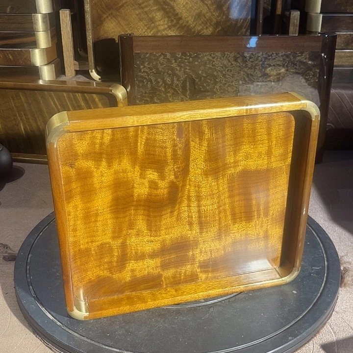 金丝楠日**辉金丝楠木乌木文盘