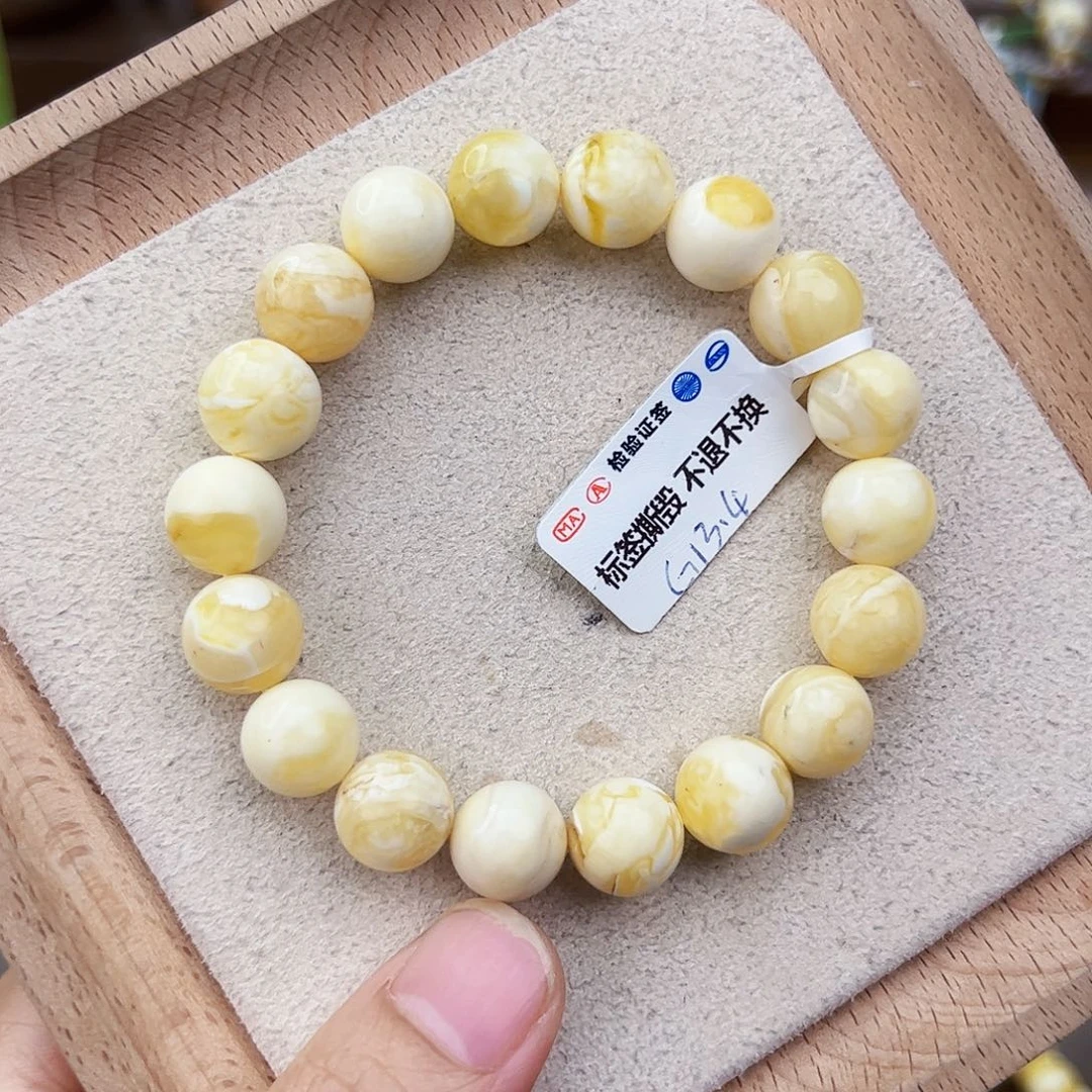 奥***柚未镶嵌琥珀手链G13.14圆珠