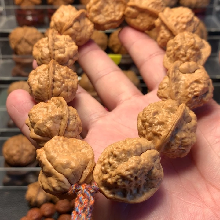 文玩核桃吊坠用****5小云石手持12颗籽