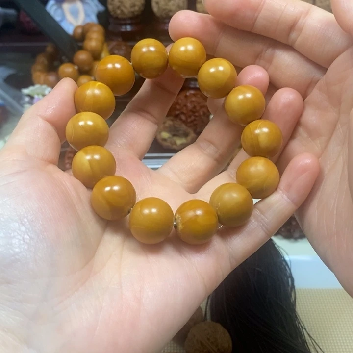 文玩核桃吊坠橄榄核光珠