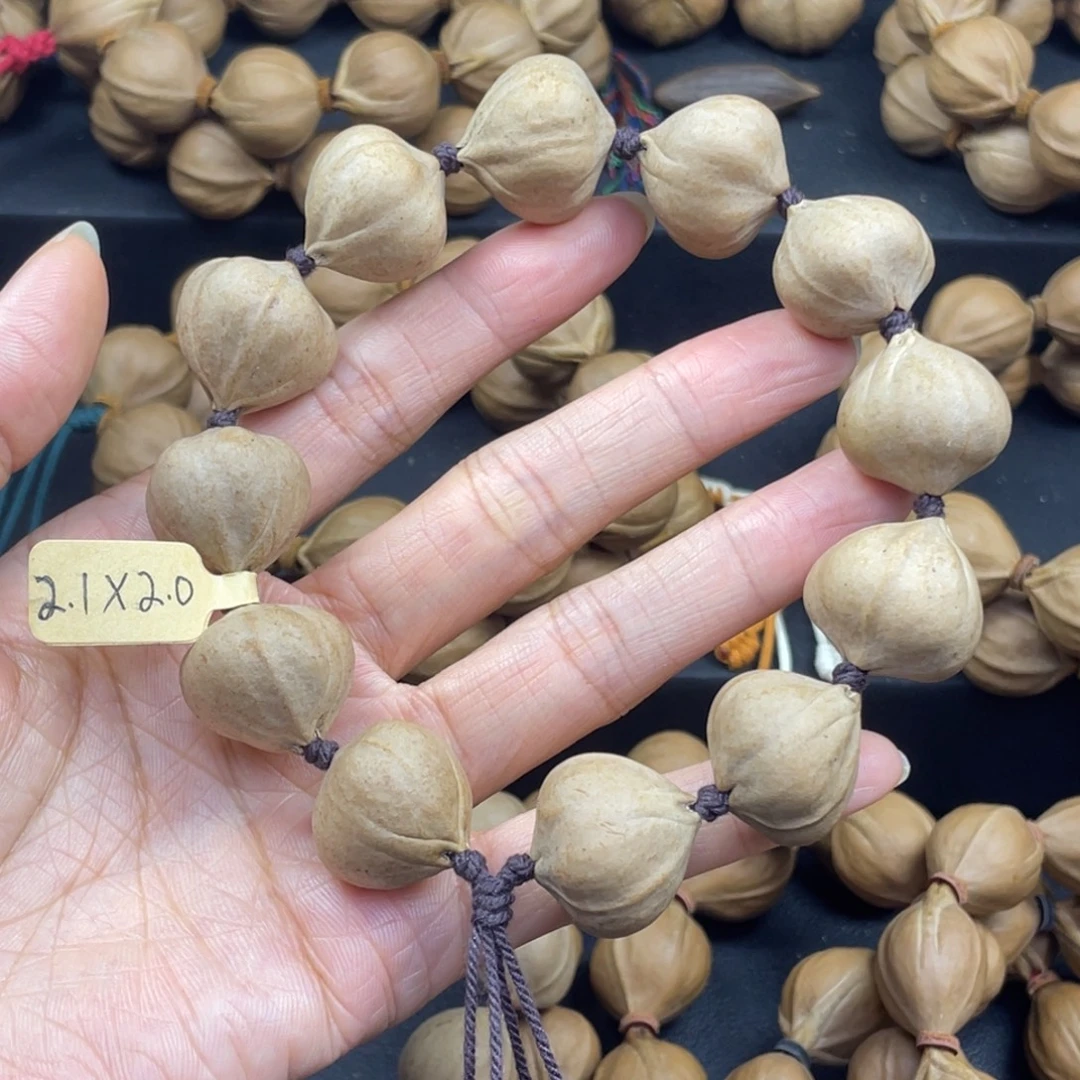 001橄榄核三花21*20