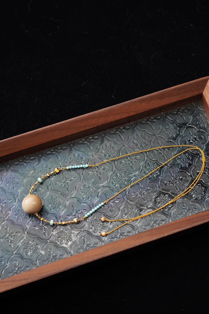 千鸟格 天然猛犸牙千层格子咖料20mm圆珠项链