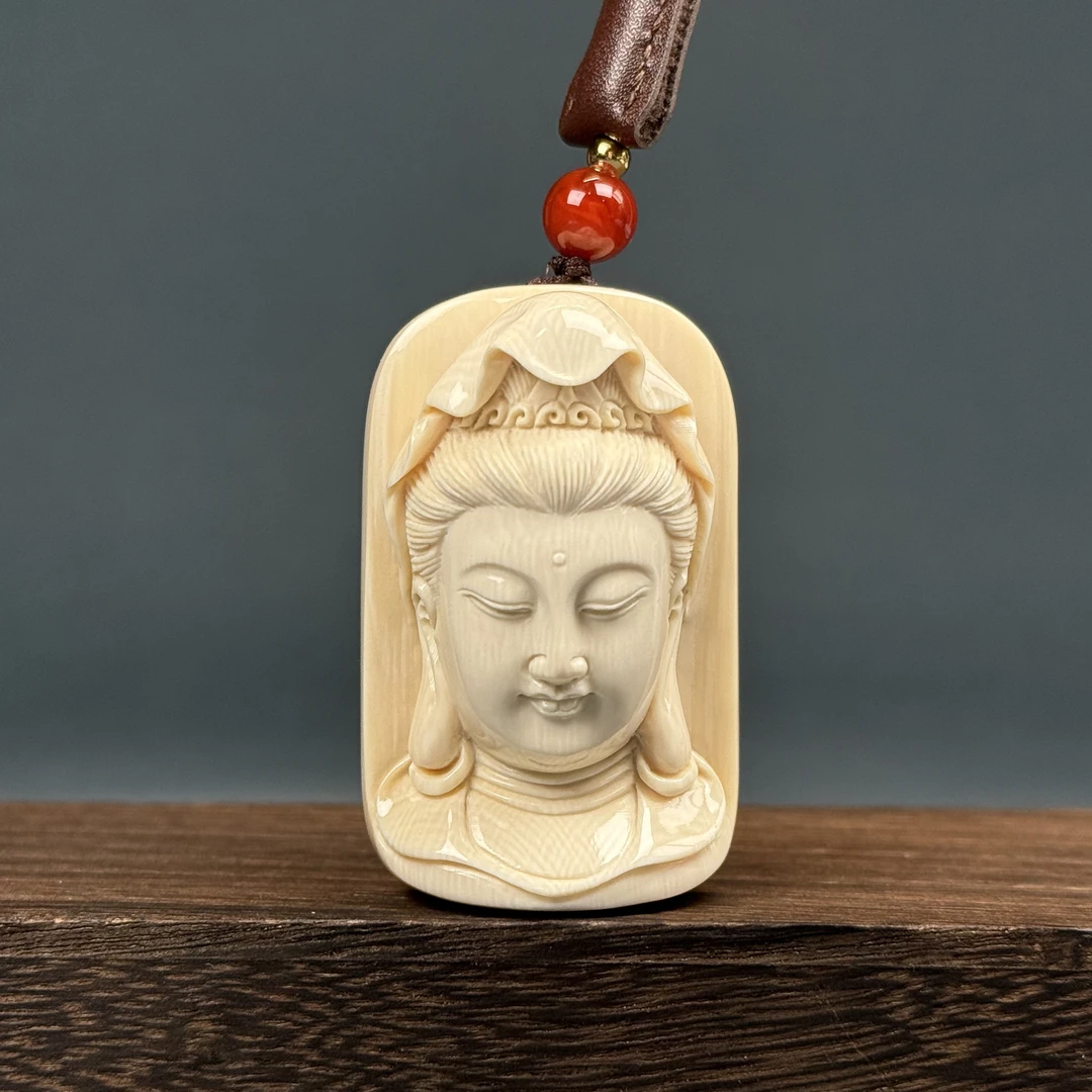 H83-22天然猛犸牙 观音佛头雕刻件33x50x20mm44.1克支持鉴定 假一