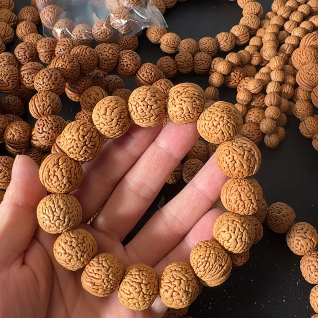 无***日桃核吊坠野生肌肉手串