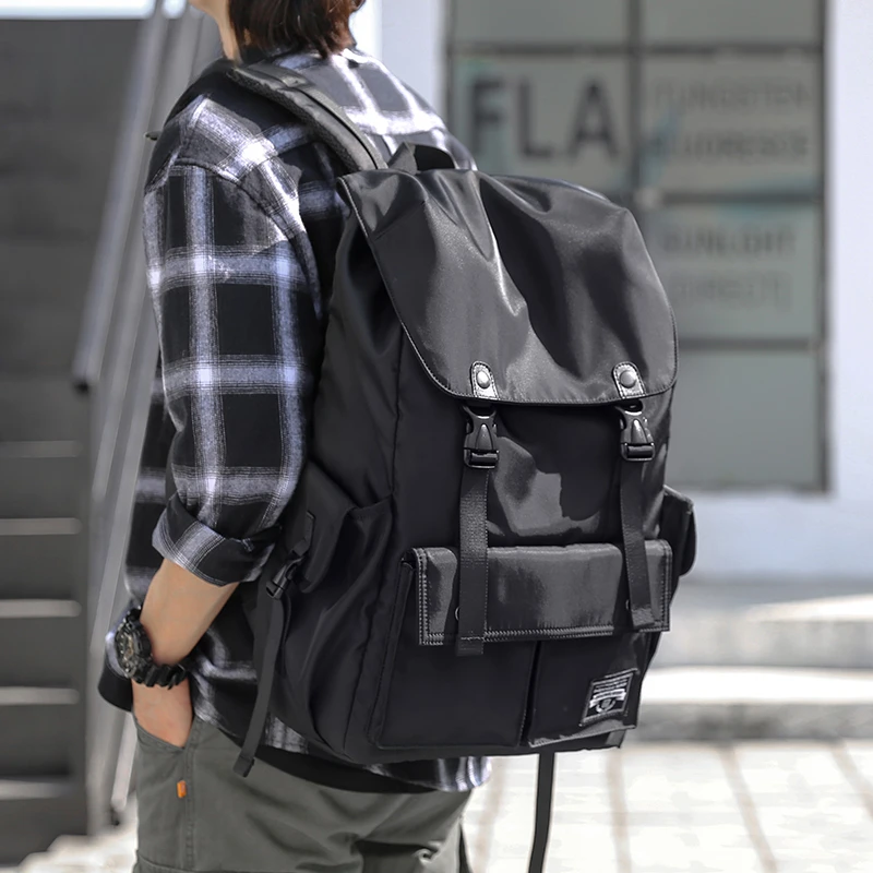 书包男士大学生双肩包潮流轻便大容量旅行包运动电脑揹包休闲男包