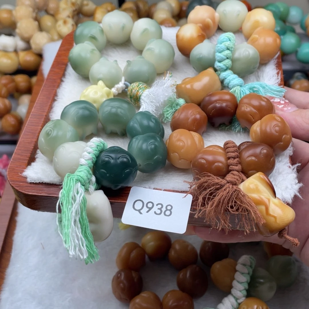我***芦菩提根/象牙果吊坠瑕WQ938兔子手捻随机一串19mm