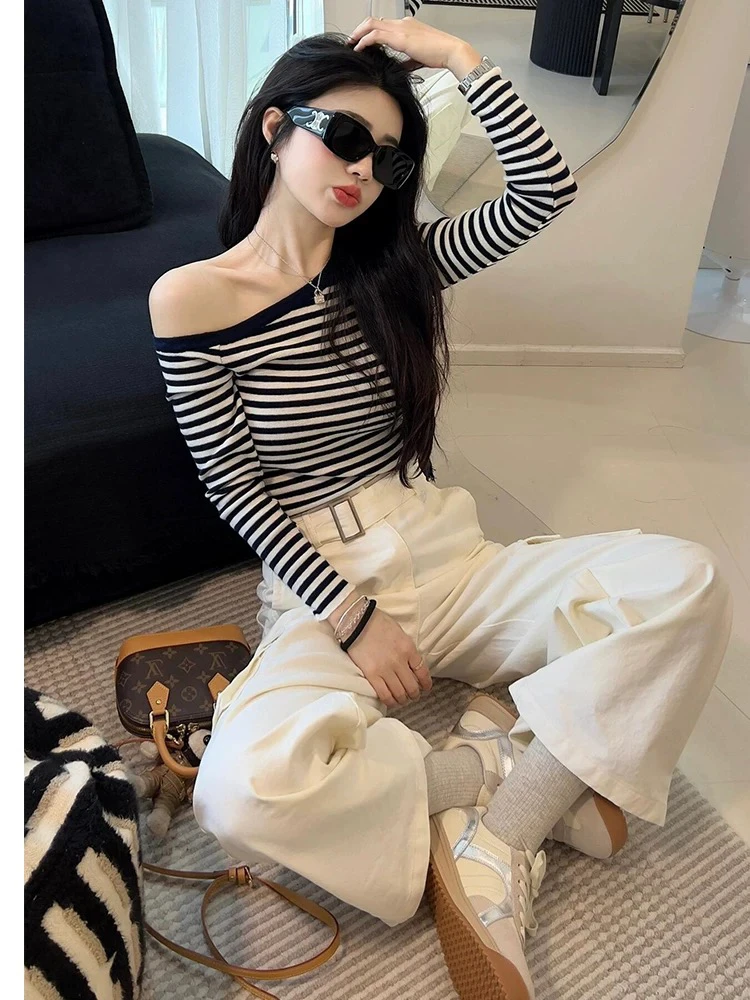 2025年春季新款设计感小众超好看一字肩条纹毛衣针织衫女修身上衣