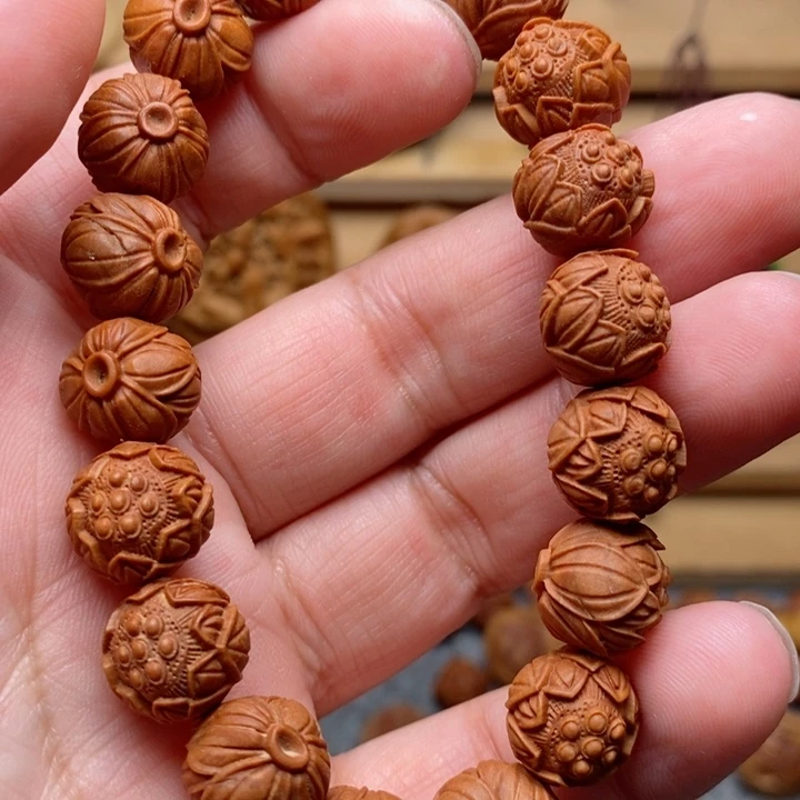 桃核雕刻莲花手串