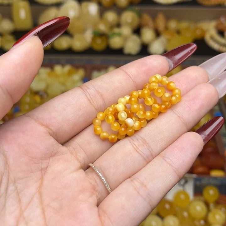 蜜蜡未镶嵌珠宝奇石鸡油黄满蜡妖花俏色跑环一个