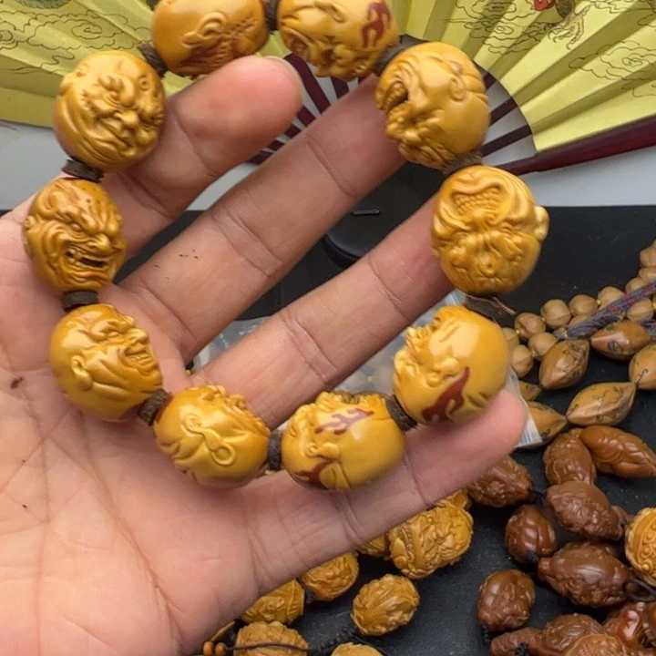 橄榄核手串/手链流*鱼咯哦最怕咯哦图