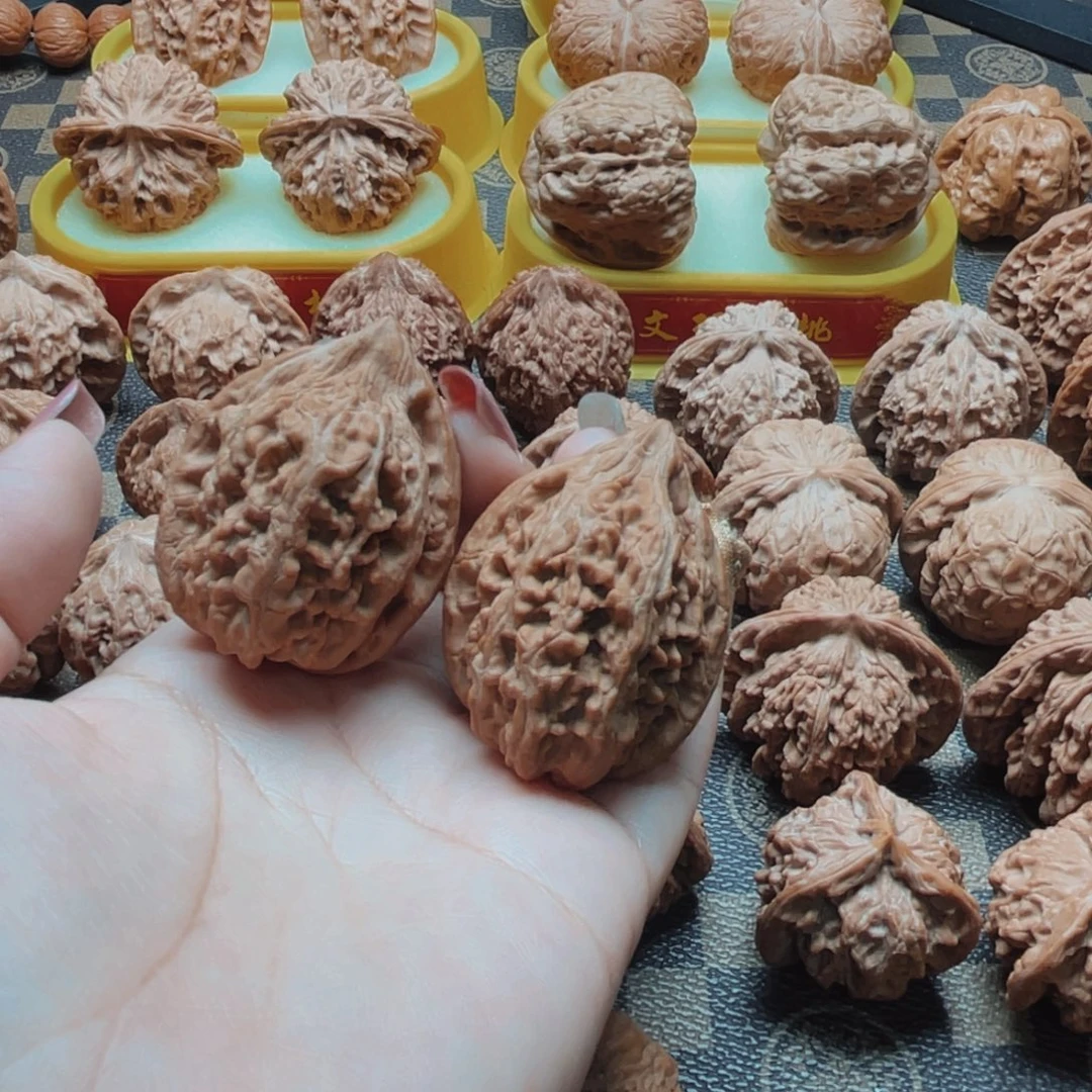 桃核把件全品大沽石
