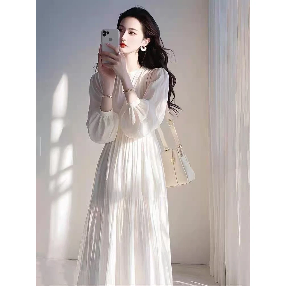 法式泡泡袖圆领连衣裙女度假风超仙收腰大摆长裙2025初秋新款裙子