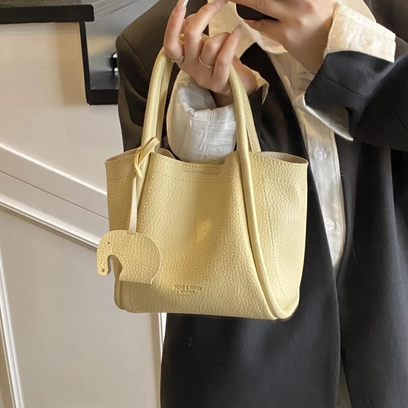 春夏季手提水桶包包女式2025新款高级感洋气单肩包休闲通勤斜挎包