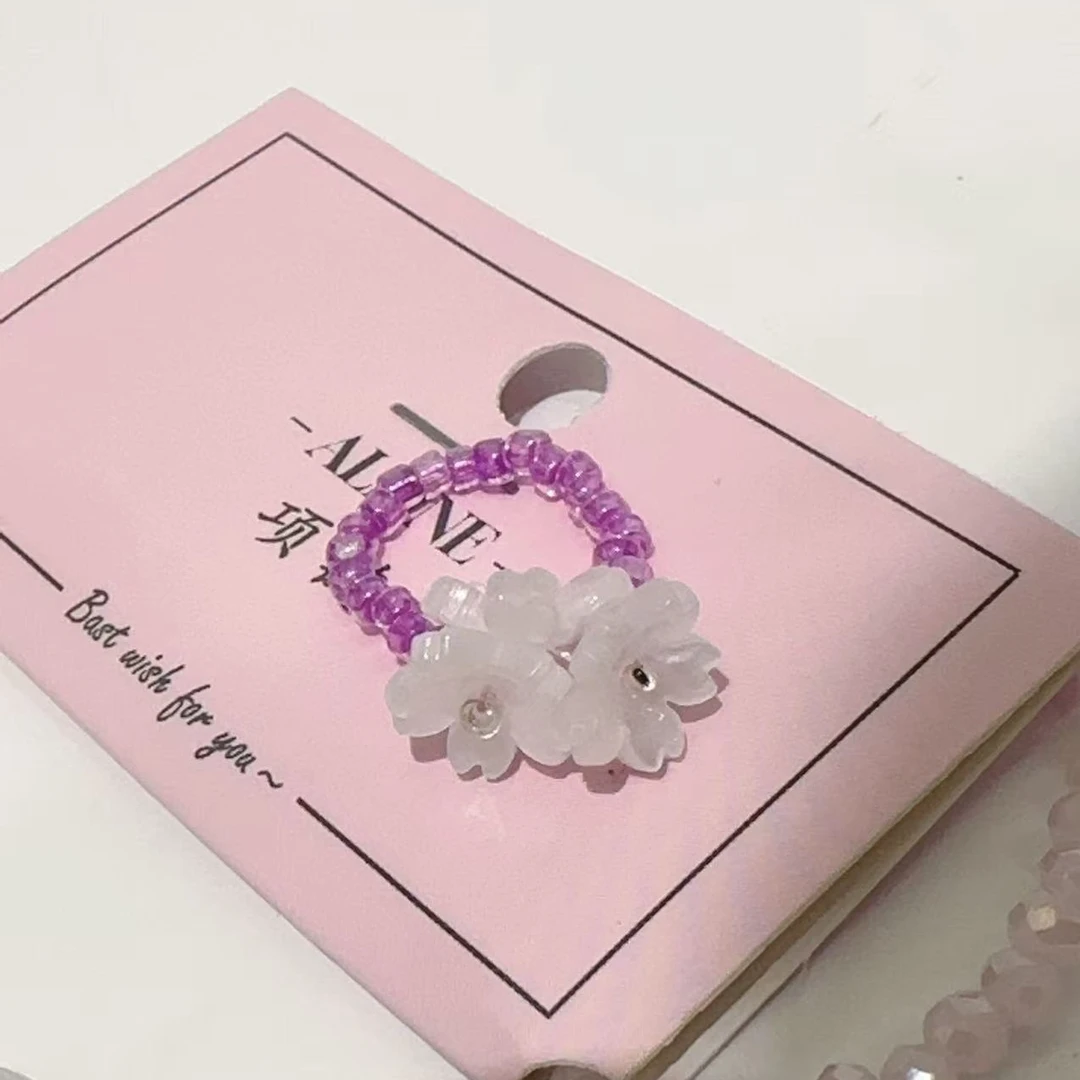 A924白色花花紫色串珠手作款戒指