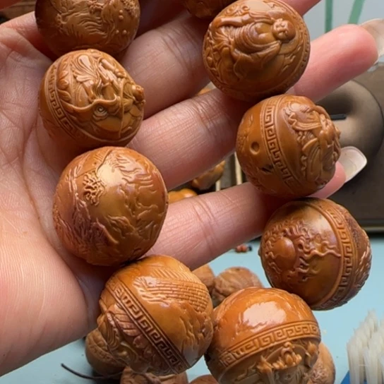 橄榄核手串8****6雕刻工艺