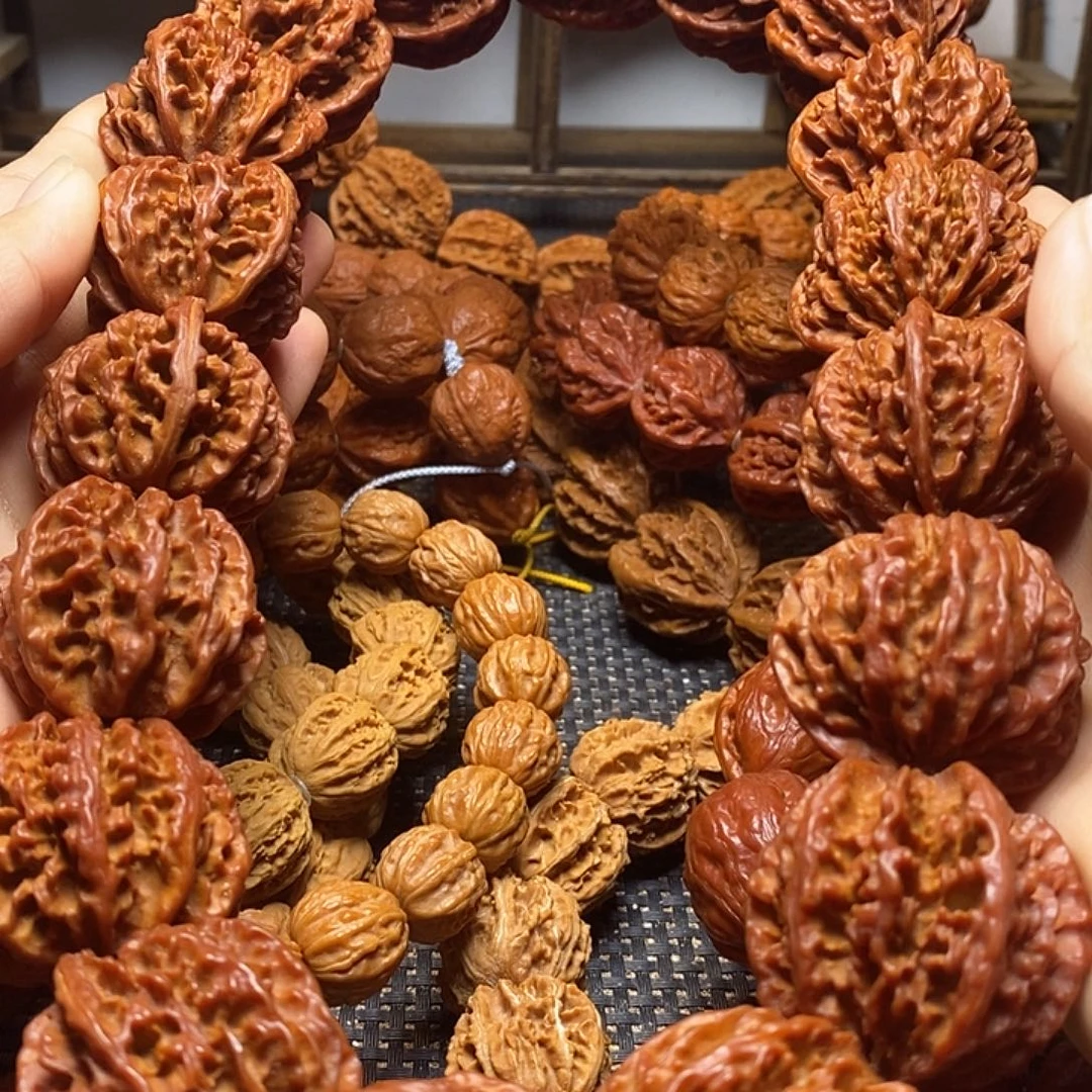 刘***川手串文玩核桃粗筋麻花手持