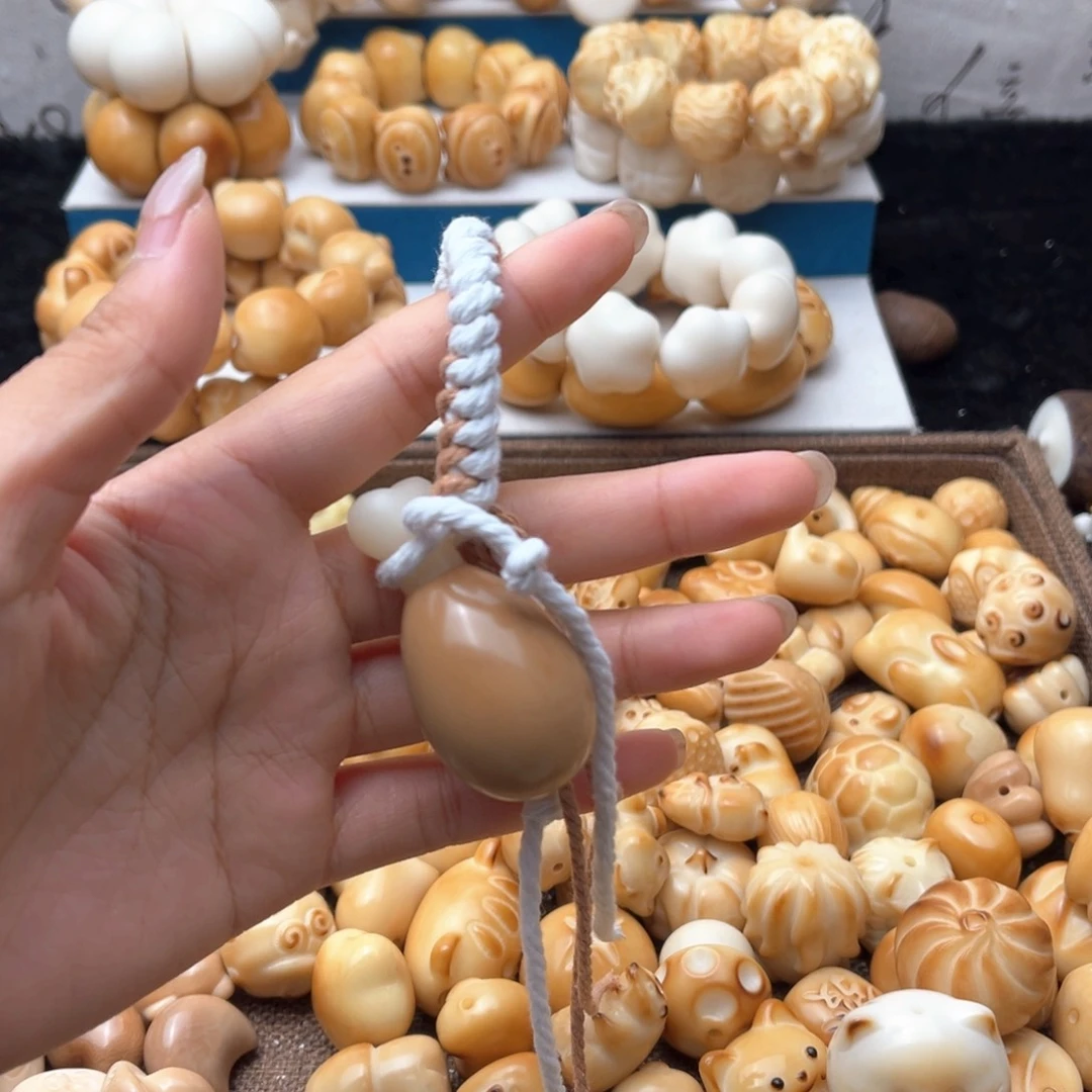 吊坠菩提根/象牙果鸡腿把家加绳