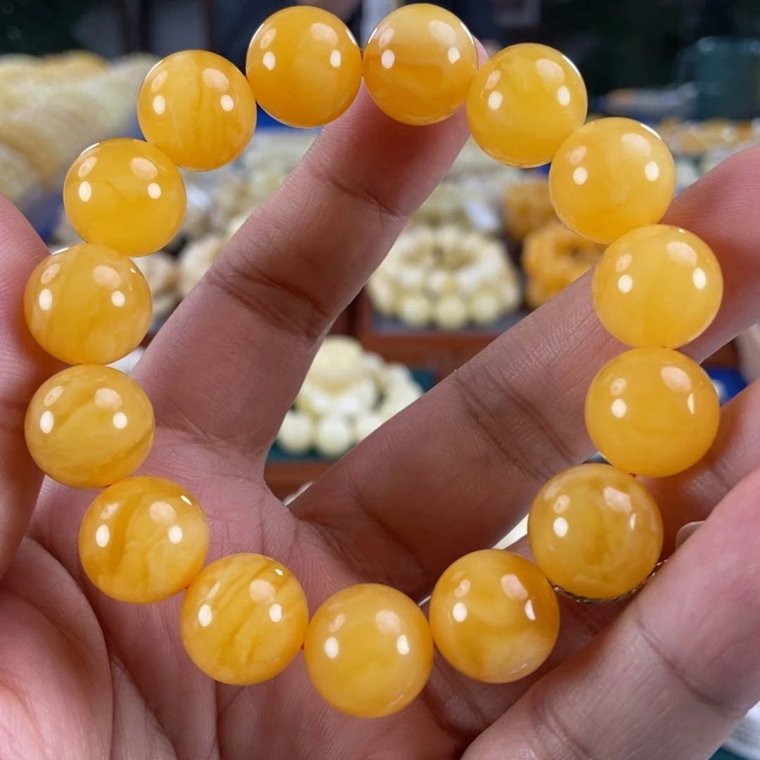琥珀未镶嵌珠宝奇石14鸡油红蜜蜡手串24.65
