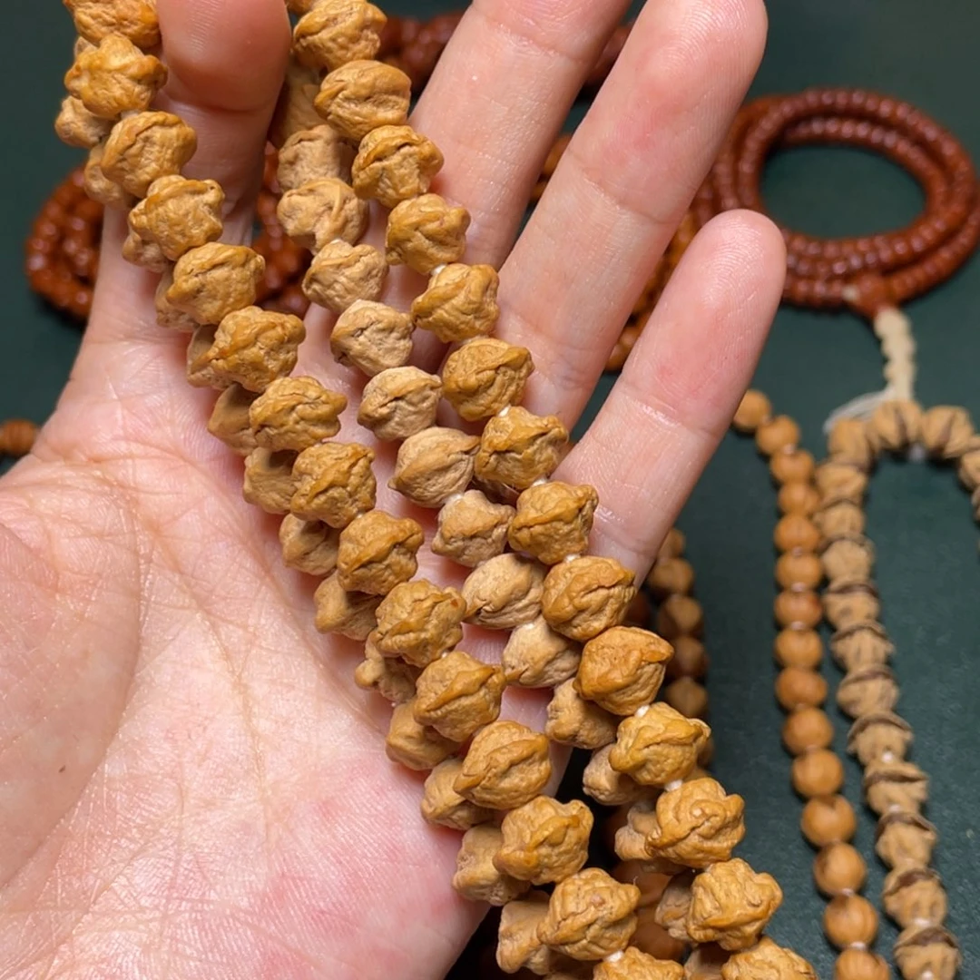 吊坠柏香籽/百香籽脸谱手持