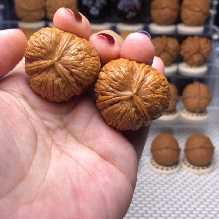 文玩核桃把件48状元红三棱33尺