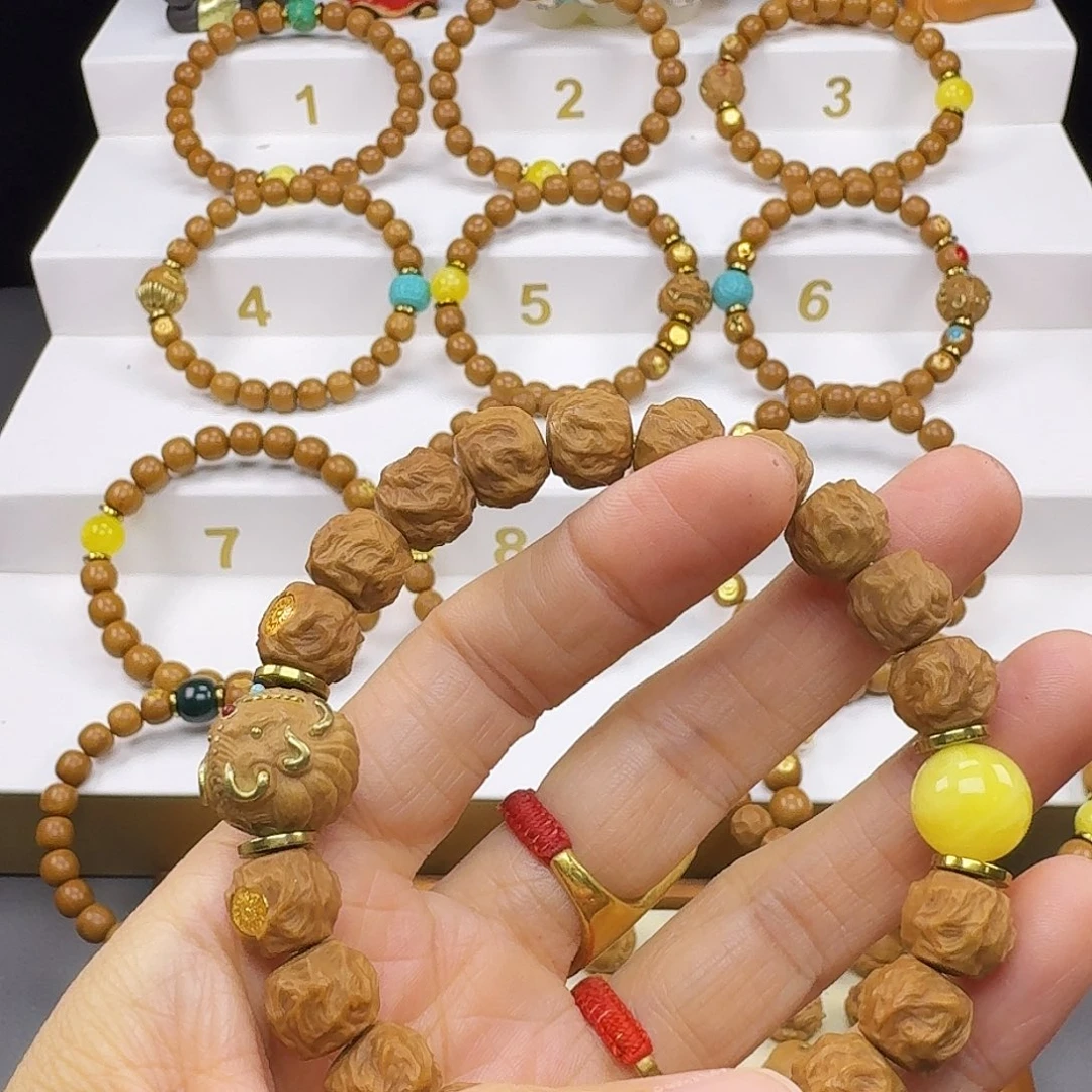 姜****猴头核桃吊坠猴头手串