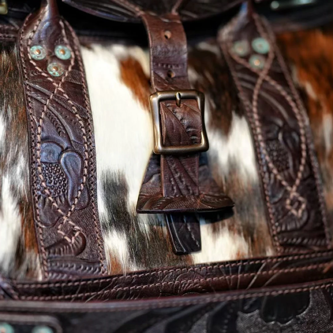 TRAD BAND雕花奶牛旅行包