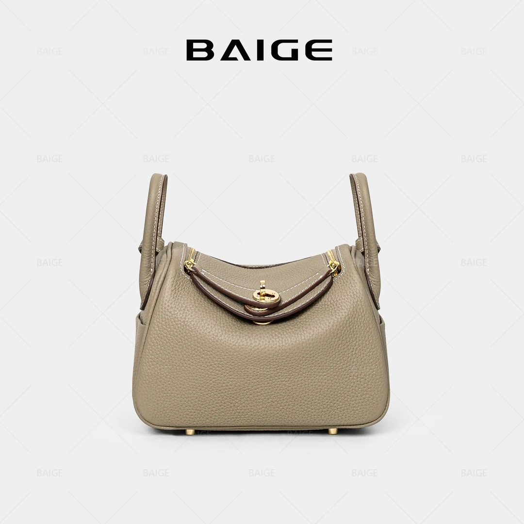 头层牛皮荔枝纹包包女2025新款通勤枕头包百搭单肩斜挎手提包2087