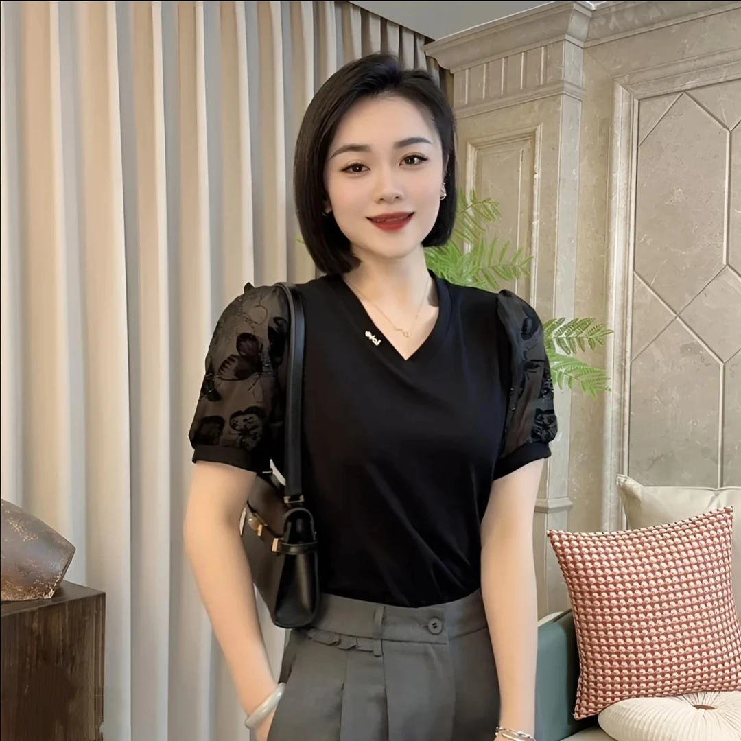 依骊汇夏款v领时尚泡泡袖个性百搭上衣女7723