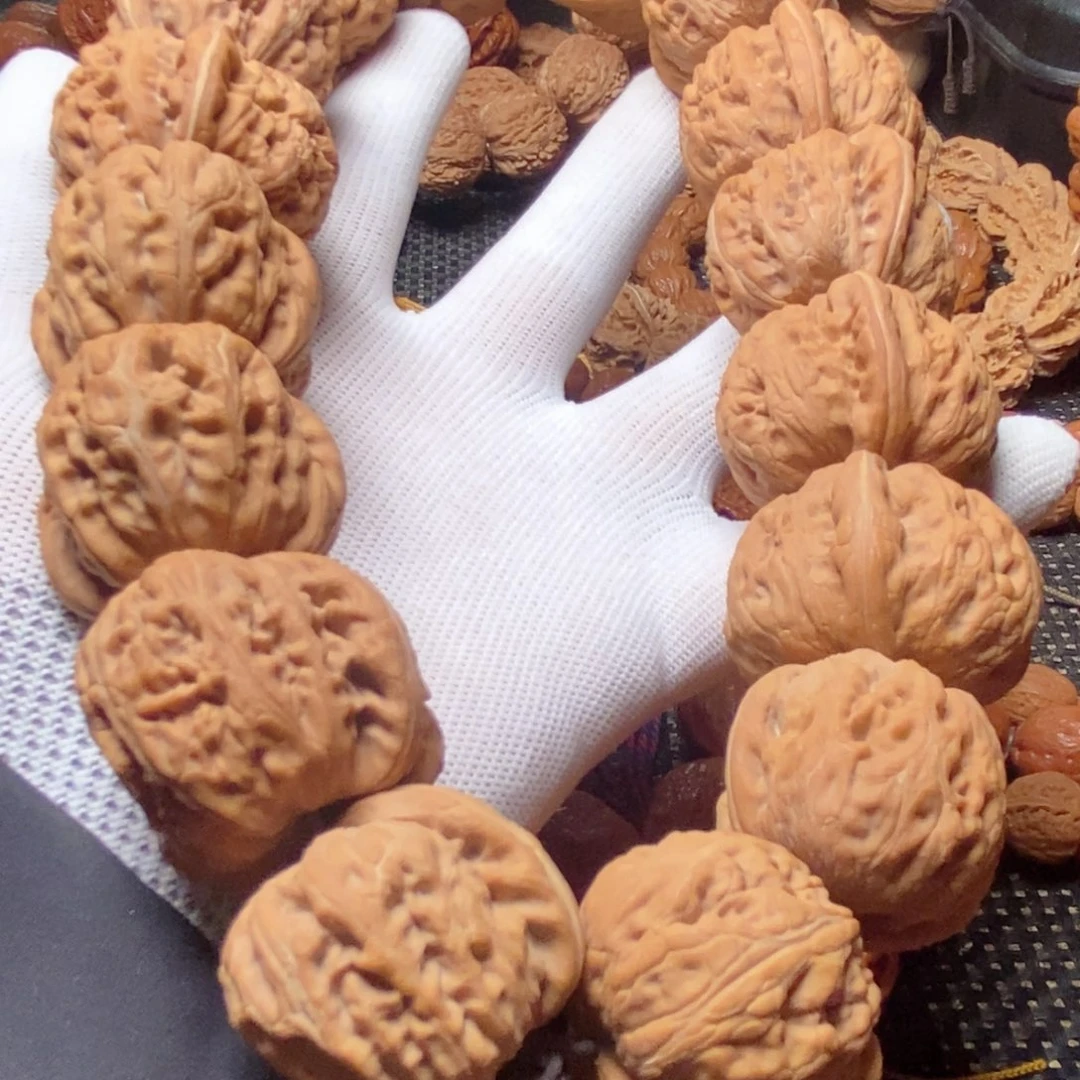 邬***智文玩核桃吊坠平谷元宝