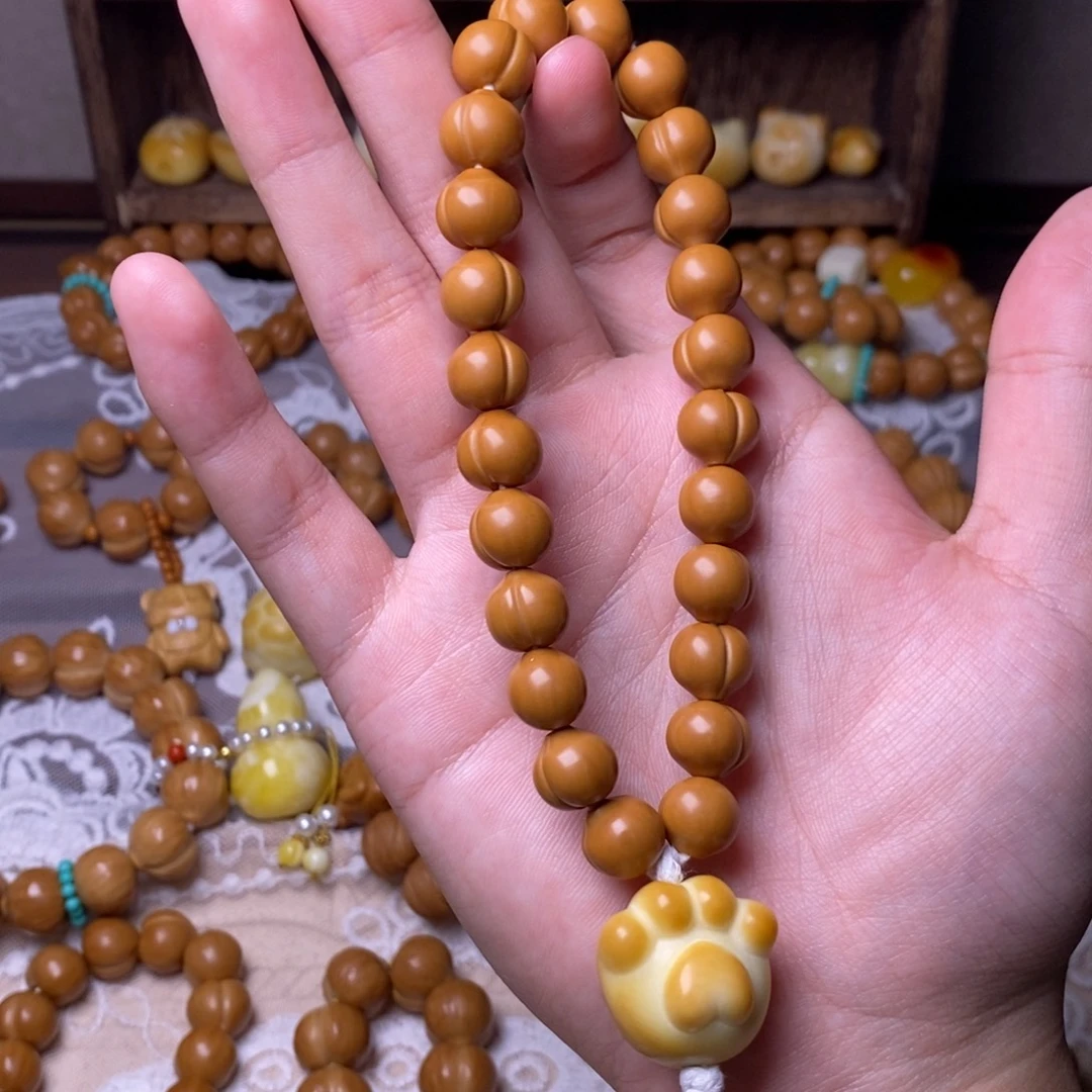 拜***饱把件猴头核桃屁桃