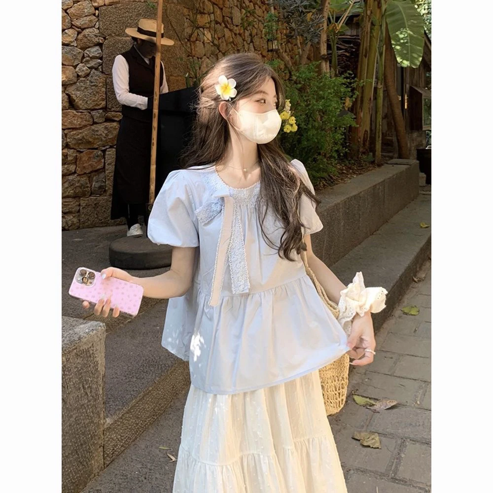 蝴蝶结蕾丝棉麻泡泡袖衬衫女夏季压褶绑带衬衣的特别致绝美上衣