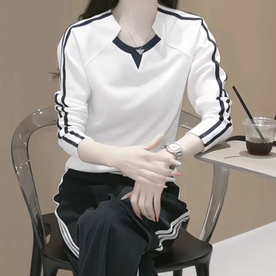 5068休闲风不规则纯色长袖拼接T恤显瘦春夏新款百搭运动减龄气质