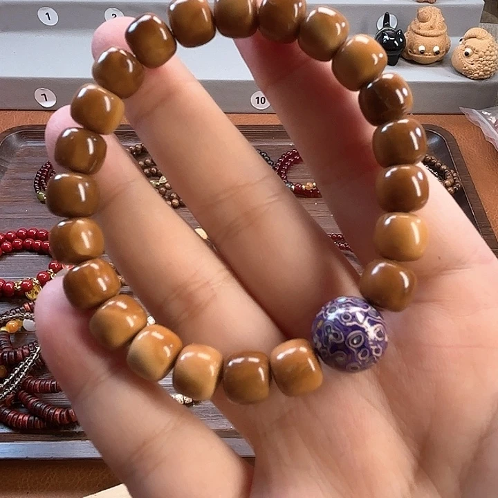 手串菩提根/象牙果海**霞