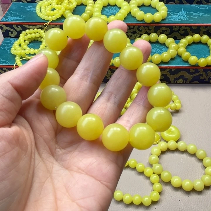 自***翔非金属新疆若羌黄口手串