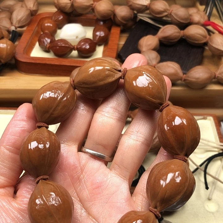 九***话手串橄榄核梅林铁核22 X29特价