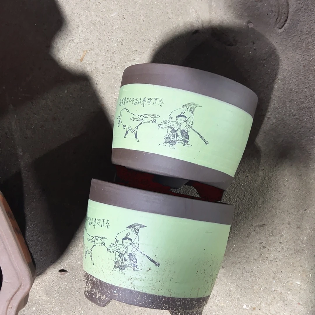 16+16绿色放牛娃笔筒