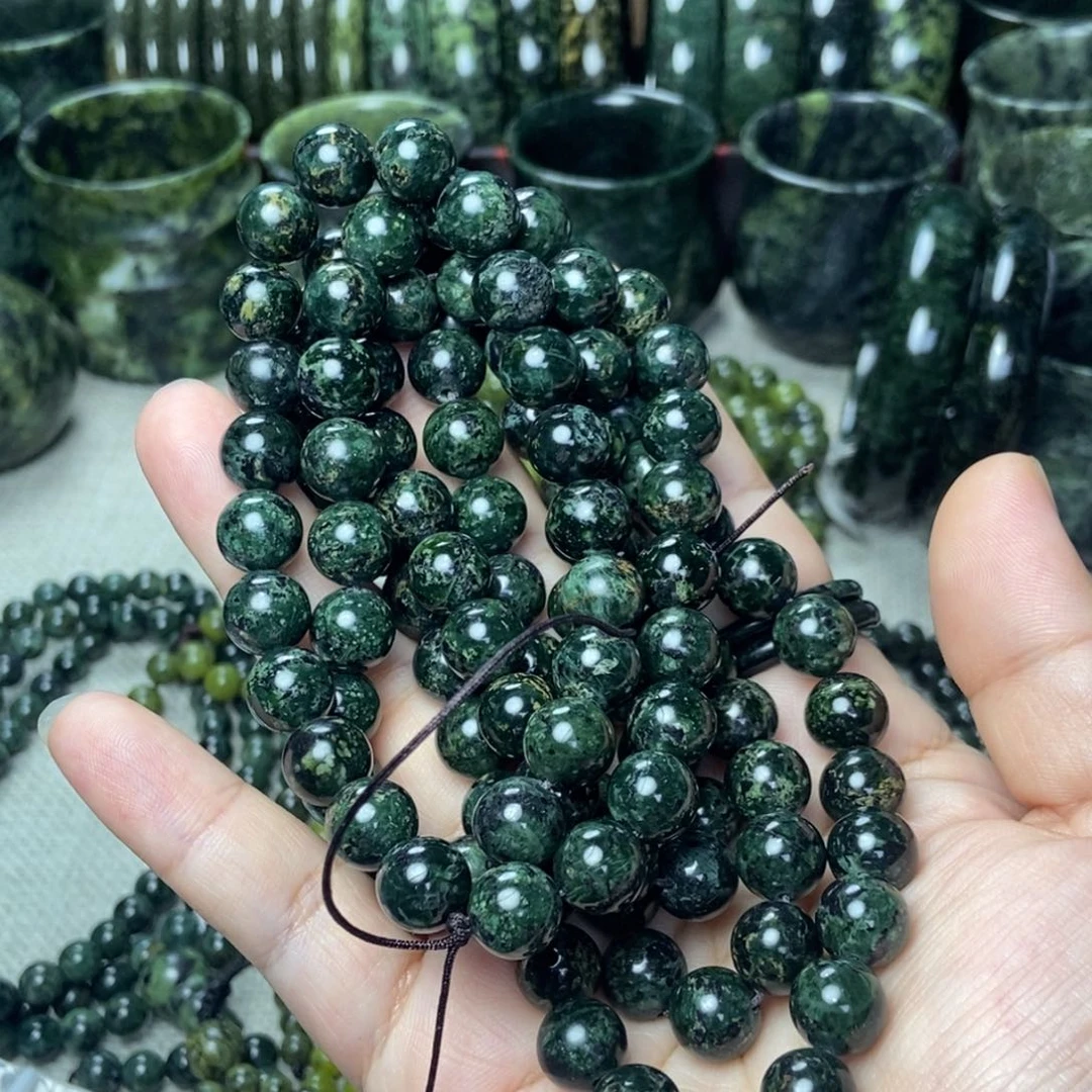 雅***雨未镶嵌蛇纹石玉手链